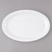 A white Thunder Group Nustone oval platter with a narrow white rim.