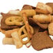 A pile of crackers and pretzels on a white background.