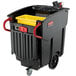 A black Rubbermaid Mega Brute rectangular waste collector with a black handle.
