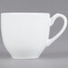 A white CAC European Bone China cup with a handle.
