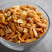 A bowl of Fiesta Sunshine Snack Mix on a table.