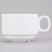 A close-up of a CAC Super Bright White porcelain cup with a handle.