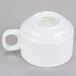 A CAC white porcelain cup with a handle.