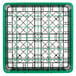 A green plastic glass rack with black and green grids on the bottom.