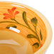 A close up of a GET Venetian bowl with a floral design.