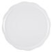A white round melamine display platter with a scalloped edge.