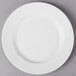 A CAC Harmony super white porcelain plate with a circular edge.