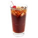 A Libbey stackable cooler glass full of iced tea with a cherry on top.