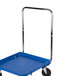 A blue cart with metal handles and wheels.