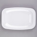 A white rectangular GET Sicilano platter with round corners on a gray background.