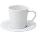 A close-up of a white GET Diamond coffee cup and saucer.