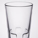 A clear Libbey stackable beverage glass with a square base.