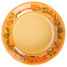 A white melamine bowl with a yellow and green floral design.
