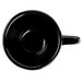 A black espresso cup with a handle.