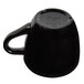 A black melamine espresso cup with a handle.