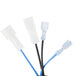 A close-up of blue and white electrical wires with white and blue connectors.