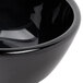 A close-up of a black bowl.