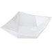 A bright white square porcelain bowl with a curved edge.