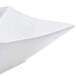 A CAC white porcelain bowl with a square shape and curved edges on a white background.
