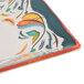 A close up of a square Get Bella Fresco melamine plate with colorful birds on it.