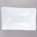 A white rectangular bowl with flared sides.