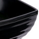 A close-up of a black GET Milano square bowl.