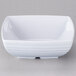A white square melamine bowl with a black handle.