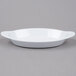 A white oval dish with two handles.