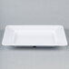 A white rectangular GET Milano melamine plate.