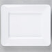 A white rectangular plate on a gray surface.