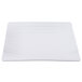 A white rectangular plate with thin wavy lines.