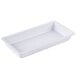 A white rectangular melamine entree dish with a handle.