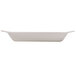 An ivory oval side dish with a handle.