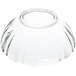 An Arcoroc clear glass bowl with a scalloped edge.