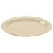 A beige oval platter with a speckled surface.