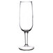 A clear Libbey flute glass with a stem.