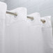 A white Oxford 100% polyester shower curtain with a metal rod.