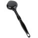 A black plastic Vollrath High Heat solid spoon with a handle.