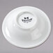 A bright white Tuxton china monkey dish with an embossed rim.