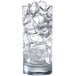 A glass filled with ice cubes from a Manitowoc ice dispenser.