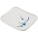 A white rectangular melamine plate with blue bamboo design on it.