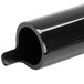 A black plastic tube with a small hole at the end.