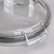 A clear plastic lid with a clear handle on a Waring 2.5 quart flat bowl.