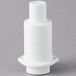 A white plastic cylinder with a small hole on top.