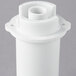 A white plastic cylinder with a hole in the center.