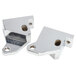 A close-up of two metal corner pieces for an ARY VacMaster vacuum sealer lid hinge.