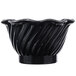 A black tulip dessert dish with wavy lines on it.