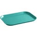 A green rectangular tray with a plastic handle.