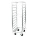 A Metro aluminum roll-in refrigerator rack with wheels.