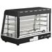 An Avantco black and silver countertop heated display case with sliding glass doors.